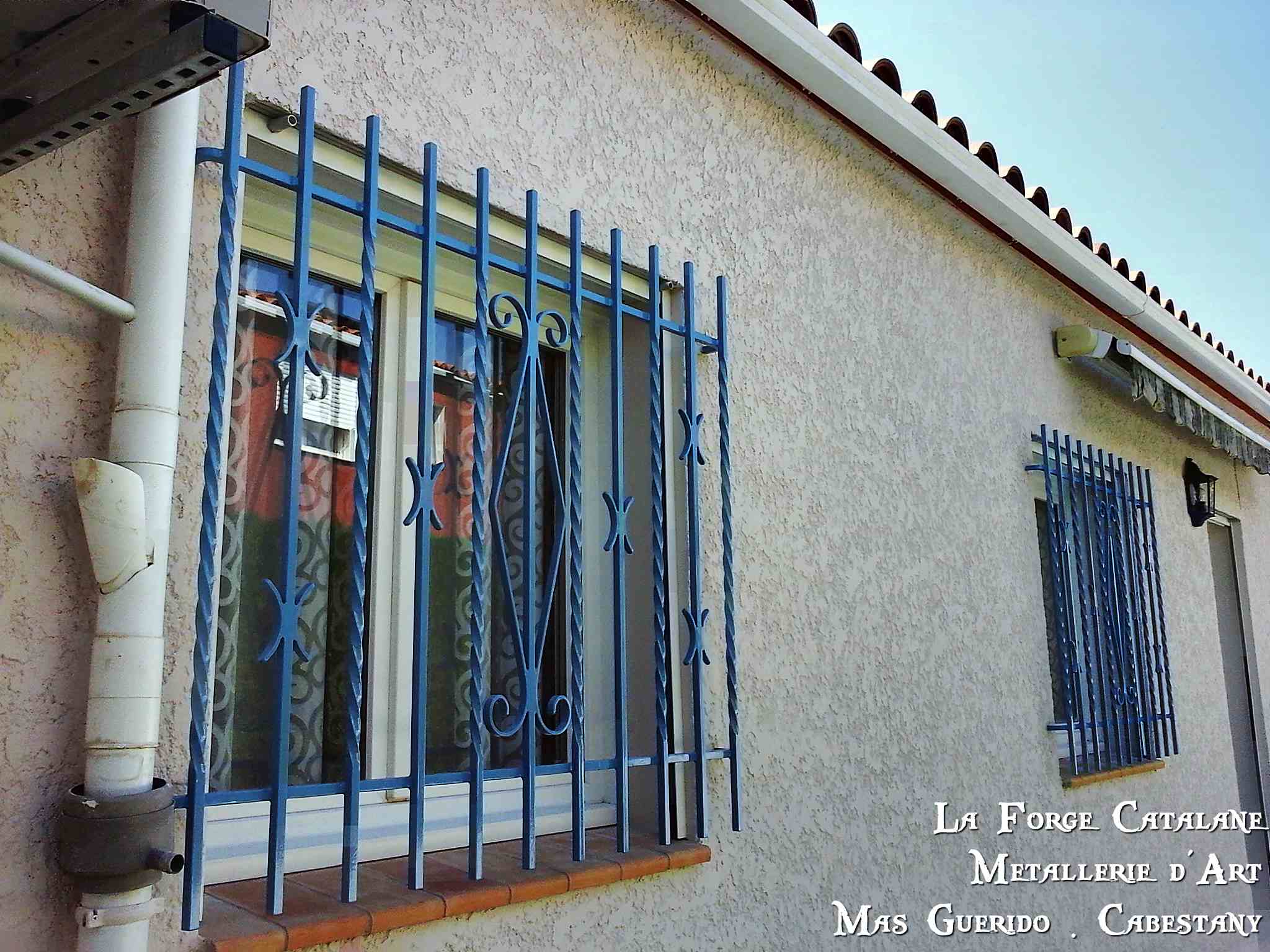 grille fixe protection barreaux droit torsade volutes fer forge catalane cabestany.jpg